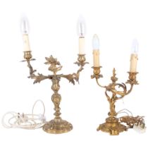 2 similar gilt-brass rococo 2-branch table candelabra. Largest - 56cm. Both converted. Wiring will