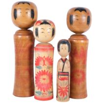 A group of 4 Japanese Kokeshi dolls, largest height 49cm