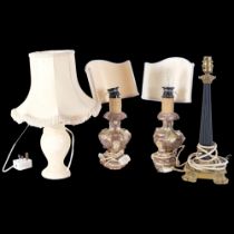 A pair of giltwood decorative table lamps, and a marble base table lamp with shade, and another,