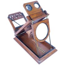 A Victorian walnut folding graphoscope / stereoscope, probably by Negretti and Zambra (no maker's