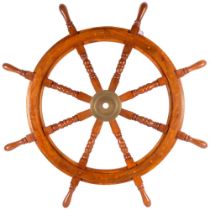 A large reproduction ship's wheel, diameter approx 88cm