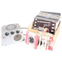A Robert Rigby 629 vintage amplifier and a quantity of vinyl records, including various LPs,