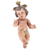 A Vintage painted composition figure of baby Jesus, L31cm, with gilt-metal crown, indistinct maker's