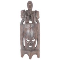 A carved African figural wall hanging. H - 70cm.