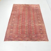 A red-ground Tekke rug. 180x127cm