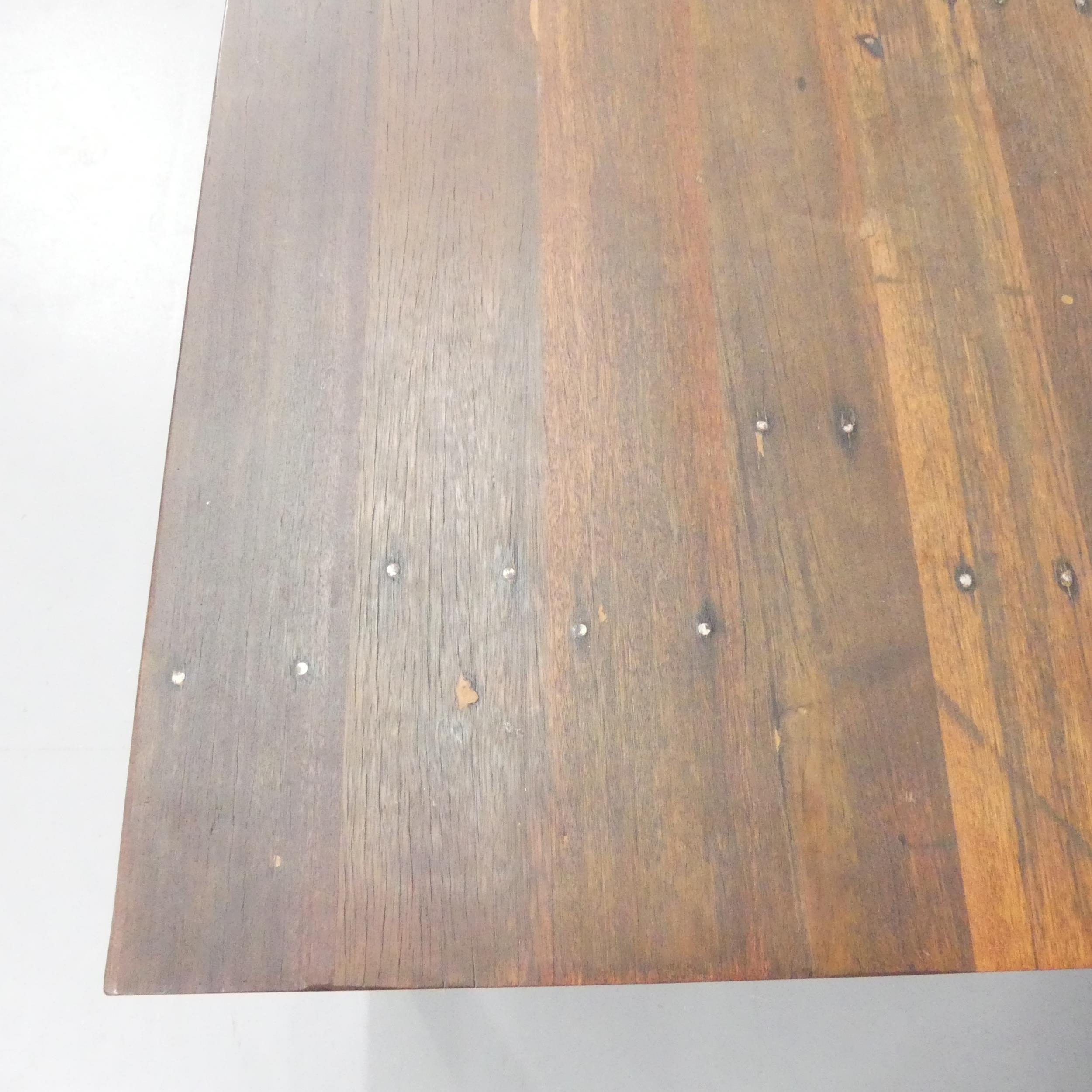 HASTINGS PIER INTEREST A stained teak planktop dining table