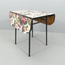A mid-century style formica-topped drop-leaf table. 68x76x56cm (opening to 106cm).