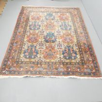 A red-ground Keshan carpet. 222x174cm