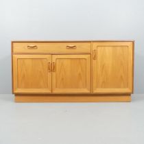 G-PLAN - A mid-century teak Plinth sideboard by Victor Wilkins, with single drawer above three