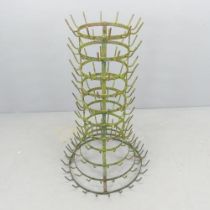 A painted metal bottle drying rack. 65x103cm.