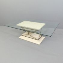 A contemporary rectangular glass-topped coffee table on composite pedestal base. 120x41x70cm