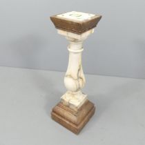 An Art Nouveau style marble column, on oak base with inset tile top. 27x84cm.