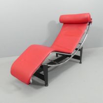 A good quality Italian LC4 Corbusier style red leather tubular steel lounger, tension straps stamped