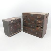 Two similar vintage Japanese kiri wood tansu chests. Largest 64x61x36cm. Largest chest is split to