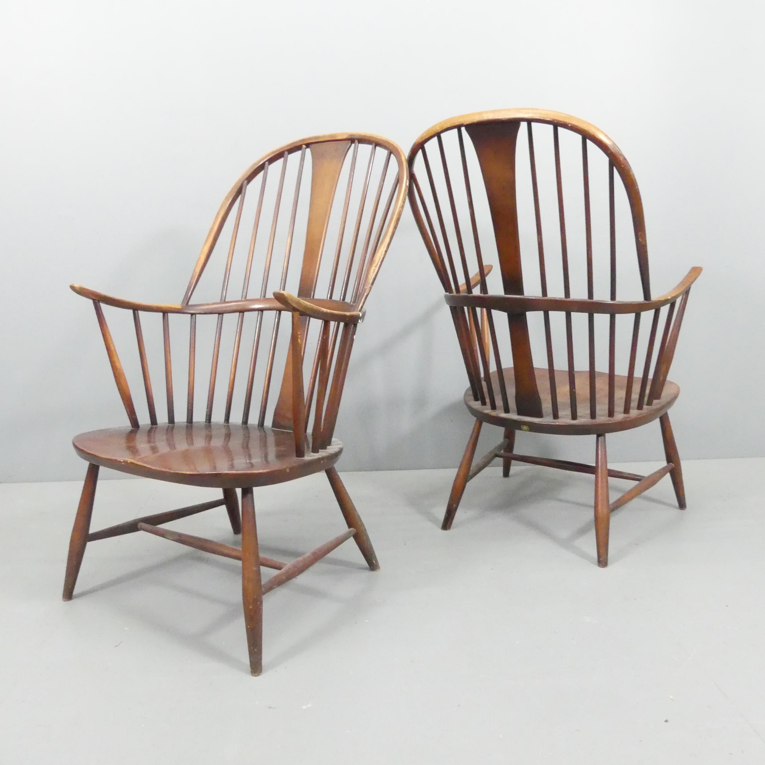 ERCOL - a pair of mid-century Chairmaker's comb-back elbow chairs. With maker's labels. - Image 2 of 3