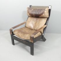 WESTNOFA - A mid-century Norwegian lounge chair, with upholstered seat on ebonised frame, and