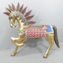 An Indonesian hand painted and gilded wooden horse. 137x132x44cm.