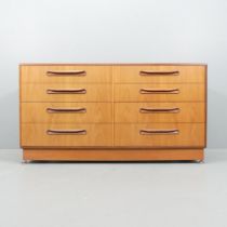 G-PLAN - A mid-century teak Fresco side-by-side chest of eight drawers. 140x76x45cm.