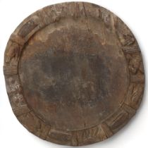 A 19th century Yoruba, Nigeria, divination tray, with carved animal detail to edges, diameter 40cm