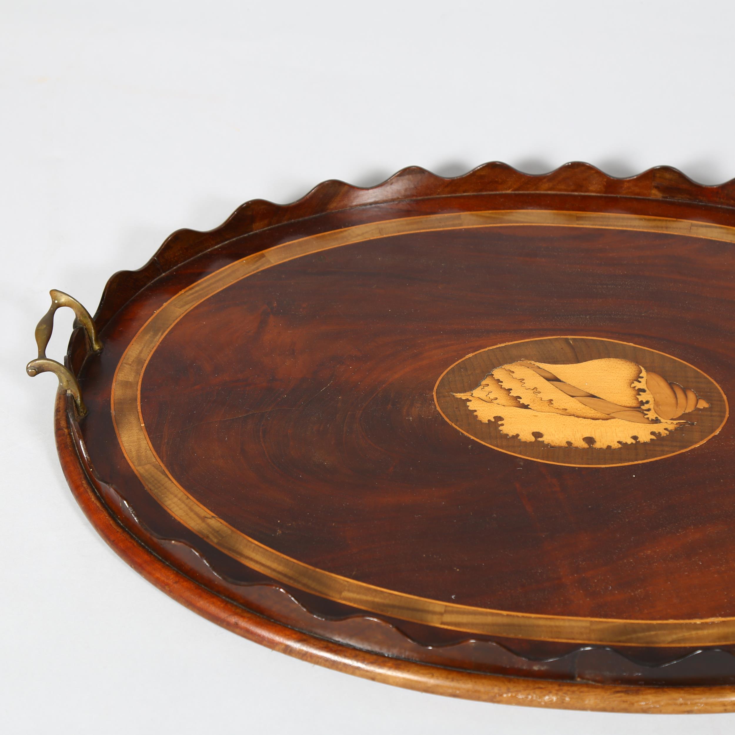 A Georgian mahogany tray with inlay boxwood conch shell motif and brass handles, length 69cm Two - Image 2 of 3