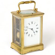 French brass-cased carriage clock with enamel dial and 8-day striking movement, case height 13cm