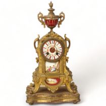 French 19th century gilt spelter and porcelain mantel clock surmounted by an urn, 8-day movement