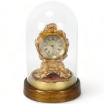 A miniature 19th century balloon cased clock, containing a 17th century movement by James