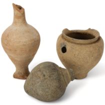 Two pieces of ancient terracotta ceramics and a stone carved amphora shaped vessel, tallest 18cm