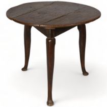 A George II oak cricket table, diameter 78cm, height 68cm Movement on base, historic woodworm, one