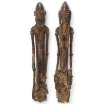 Two Dogon, Ghana, copper figures, a male warrior and woman with children, height 32cm