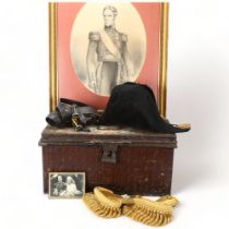 A Royal Navy bicorn hat and epaulettes, late 19th/early 20th century, by Gieve, Matthews &