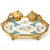 A 19th century Sevres porcelain and and ormolu mounted desk stand, width 26cm The porcelain dish has