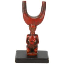 A Baule, Ivory Coast catapult, carved wood female figure on wooden plinth, height 16cm Good