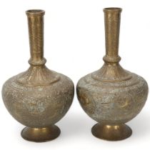 Pair of 19th century bronze narrow-neck vases, Qajar, Iran, with engraved animal designs and