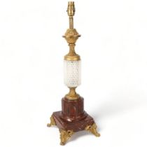 A red marble gilt-bronze and cut-glass table lamp, early to mid-20th century, overall height 53cm
