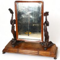 A large and impressive 19th century mahogany toilet mirror, supported by carved Classical gurgle