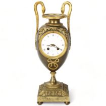 19th century French bronze urn-shaped mantel clock, with relief cast mounts and swan handles, enamel