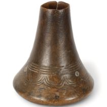 A Hima, Uganda carved wood milk pot, height 23cm Cracks to sides at rim and crack at base