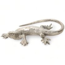 A small silvered bronze lizard, early 20th century, length 14cm Good condition