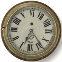 A ship's brass-cased dial wall clock with 8-day movement, bezel diameter 22cm