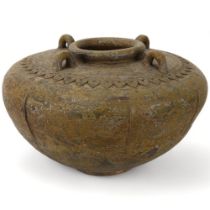 A large Indian ceramic water vessel, with shoulder rings and leaf decoration, diameter 44cm,