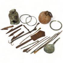 A group of Bronze and other metal antiquities, including a bronze bell, bangles, arrowheads etc.