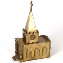 A heavy gauge brass musical box in the form of a church, possibly trench art, height 20cm Good