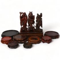 A group of Chinese carved wood stands, and 3 Chinese carved wood figures