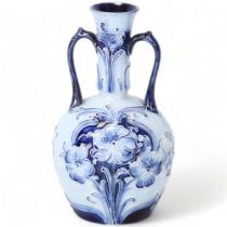 William Moorcroft for James MacIntyre, a Florian Ware handled vase, circa 1900, brown printed