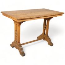 A Victorian light oak Arts and Crafts tressle table, height 73cm, top 110 x 60cm Good condition,