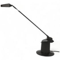 A Dutch Postmodern halogen adjustable desk-lamp, black plastic and aluminium, extended height 70cm