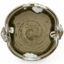 TAKESHI YASUDA (b.1943) a large two-handled flat stoneware dish with iron green glaze and chun