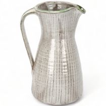 DAVID LEACH (1911-2005), British, a grey and green glaze jug with sgraffito lines, makers mark to