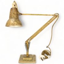 A Herbert Terry Anglepoise lamp, original mottled paintwork, original two-step base, makers stamp,